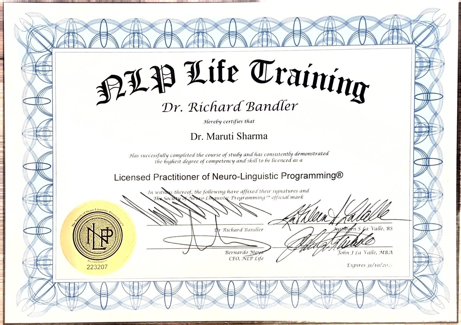 Licensed Practitioner of Neuro-Linguistic Programming certificate signed by Dr. Richard Bandler
